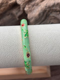 🌺Bracelet jonc rigide à ressort -Émail fleuri thaïlandais.