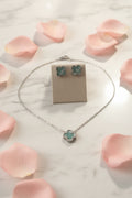 Ensemble collier et boucle d’oreille trèfles