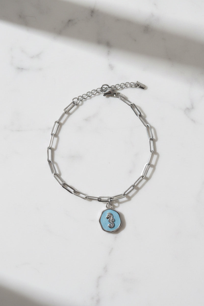 Bracelet argenté avec charmes aux choix